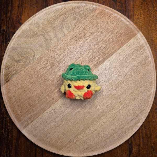 Baby Duck With Frog Hat